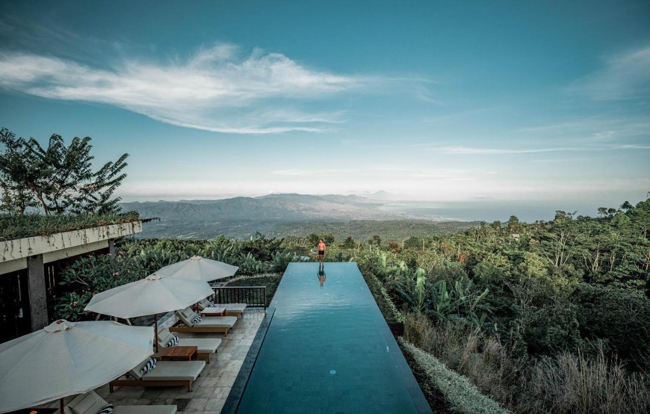 Munduk Moding Plantation Nature Resort Exterior photo The view from the pool at Alila Jabalí